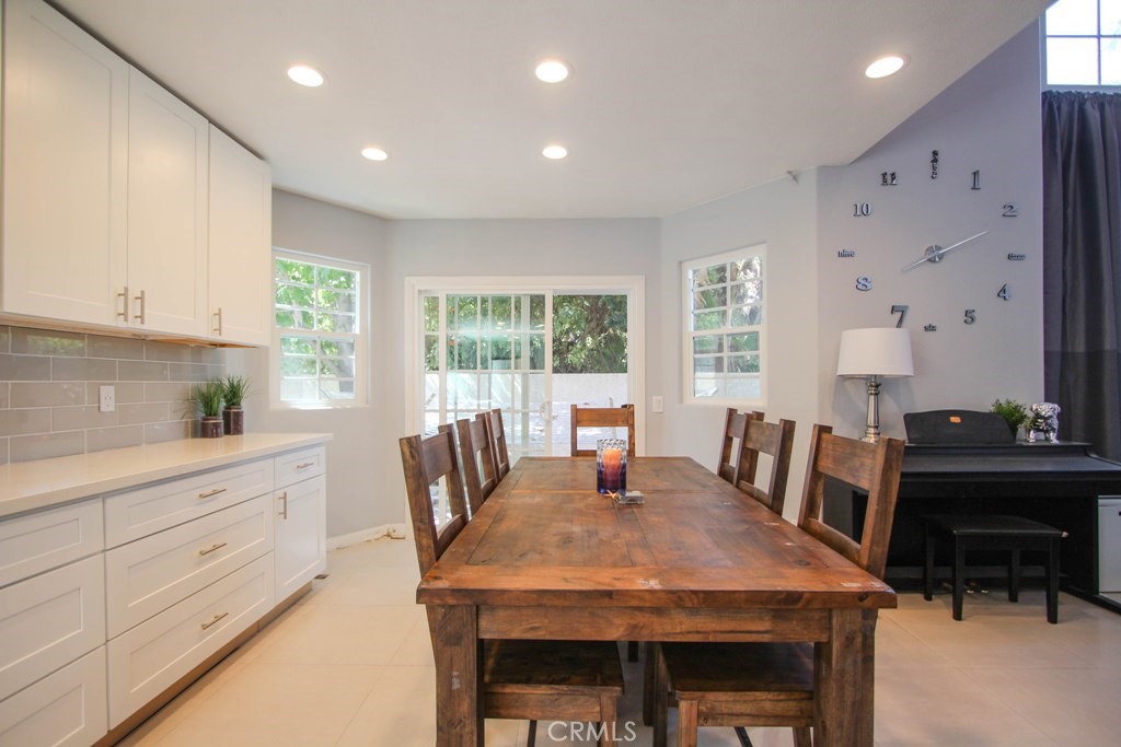 1920 Maple Avenue, Unit A Costa Mesa, CA 92627 - Photo 14 of 35 a view of a dining room with furniture window and outside view