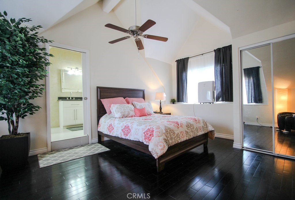 1920 Maple Avenue, Unit A Costa Mesa, CA 92627 - Photo 15 of 35 a bedroom with a bed and a window