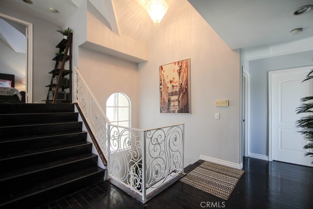 1920 Maple Avenue, Unit A Costa Mesa, CA 92627 - Photo 24 of 35 a view of entryway and hall with wooden floor