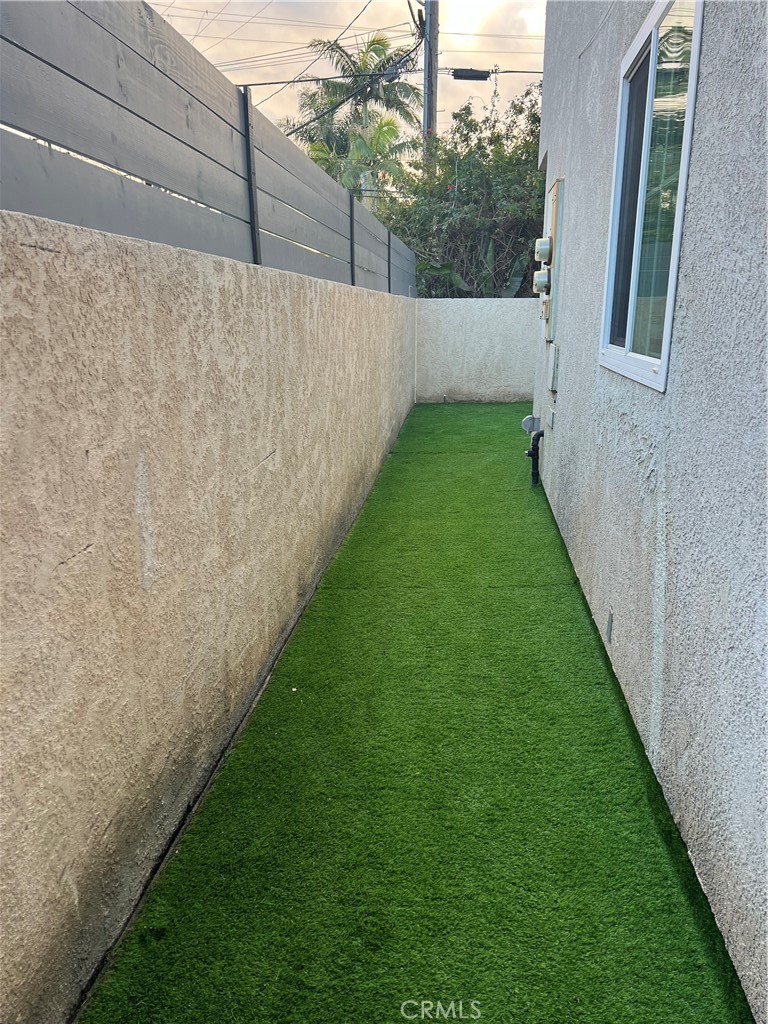 1920 Maple Avenue, Unit A Costa Mesa, CA 92627 - Photo 35 of 35 a view of a backyard with garden