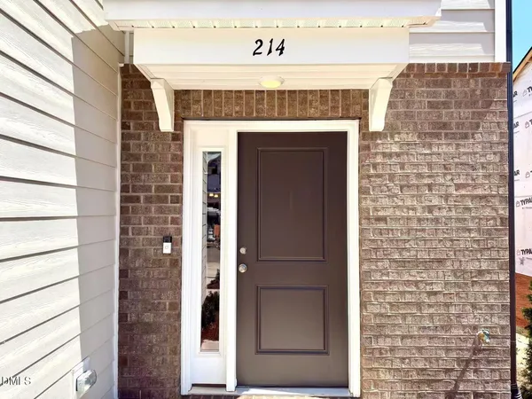 a front view of a building with a door