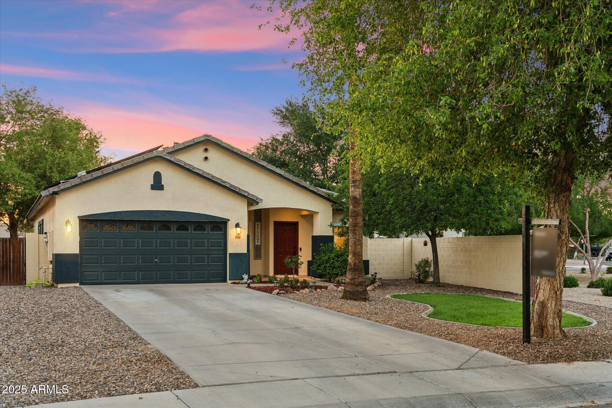 a view of backyard of house and outdoor seating