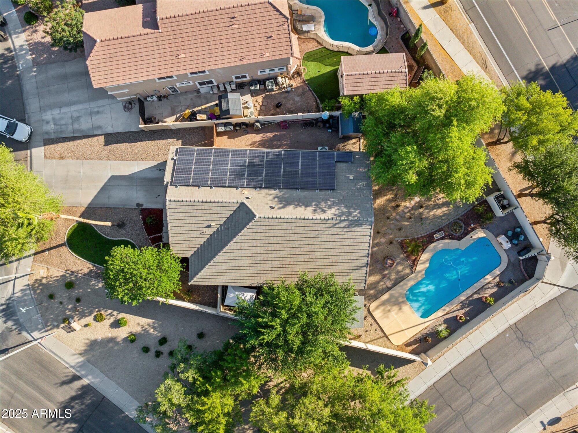 1924 South Rome Street Gilbert, AZ 85295 - Photo 18 of 60 an aerial view of a house with a yard potted plants and large tree