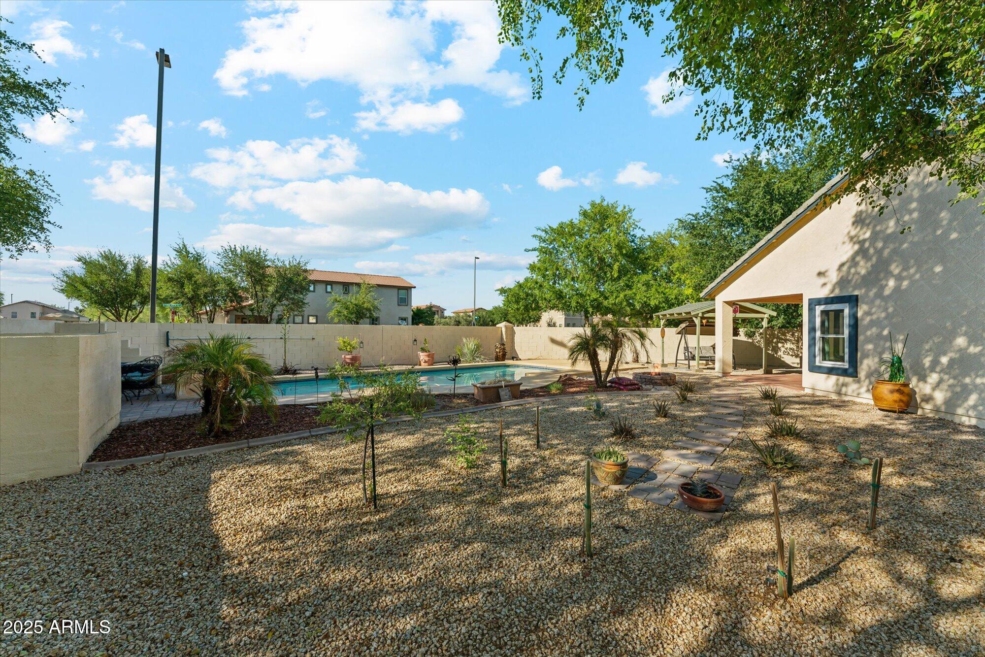 1924 South Rome Street Gilbert, AZ 85295 - Photo 29 of 60 a view of a backyard with sitting area