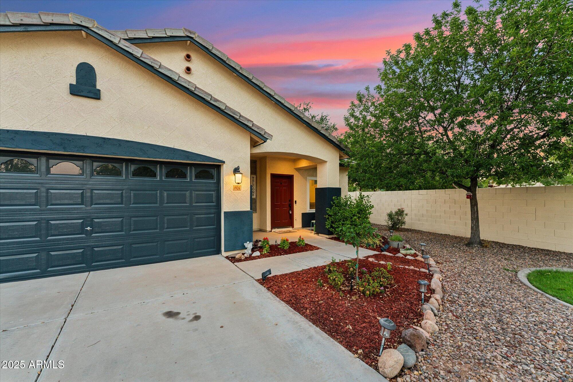 1924 South Rome Street Gilbert, AZ 85295 - Photo 2 of 60 a view of a house with a patio
