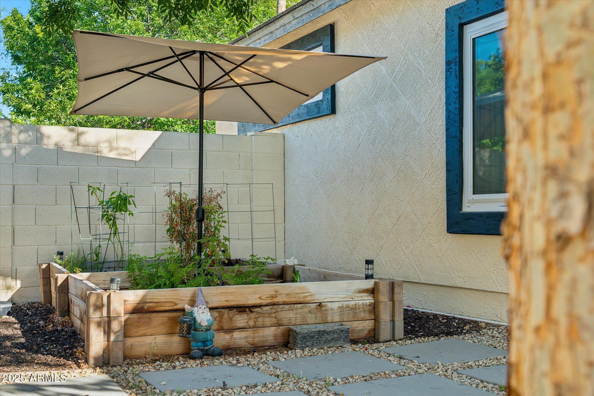 1924 South Rome Street Gilbert, AZ 85295 - Photo 30 of 60 a view of house with yard and sitting area