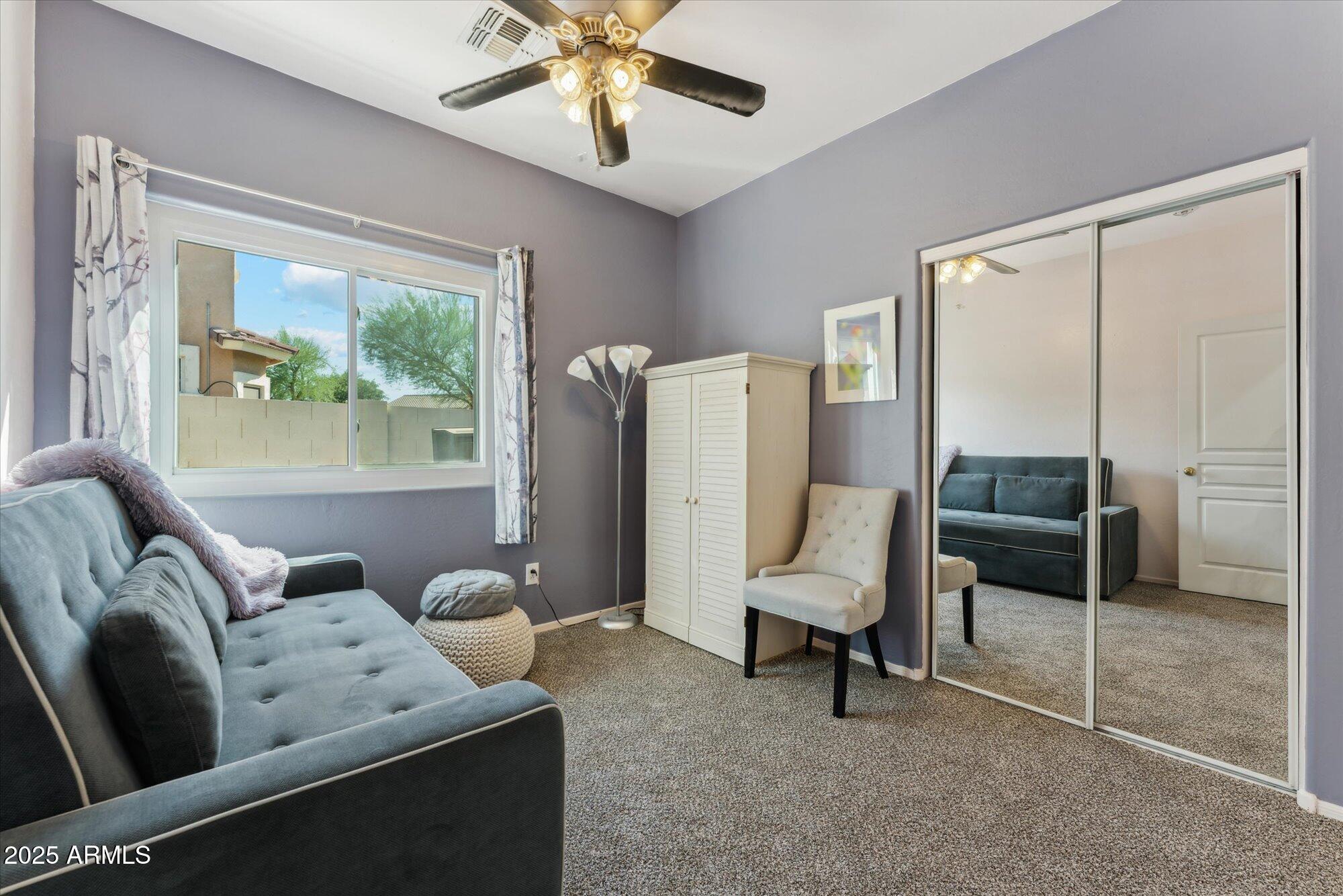 1924 South Rome Street Gilbert, AZ 85295 - Photo 33 of 60 a living room with furniture and a large window