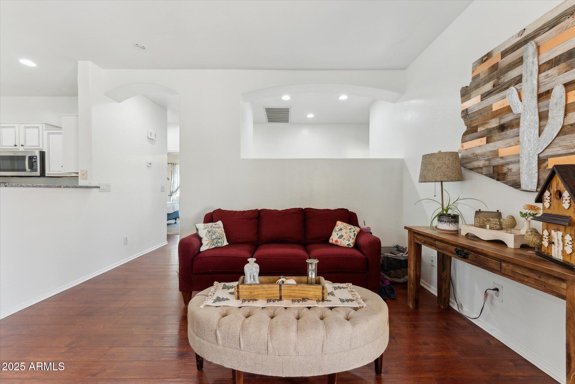 1924 South Rome Street Gilbert, AZ 85295 - Photo 50 of 60 a living room with furniture and kitchen view