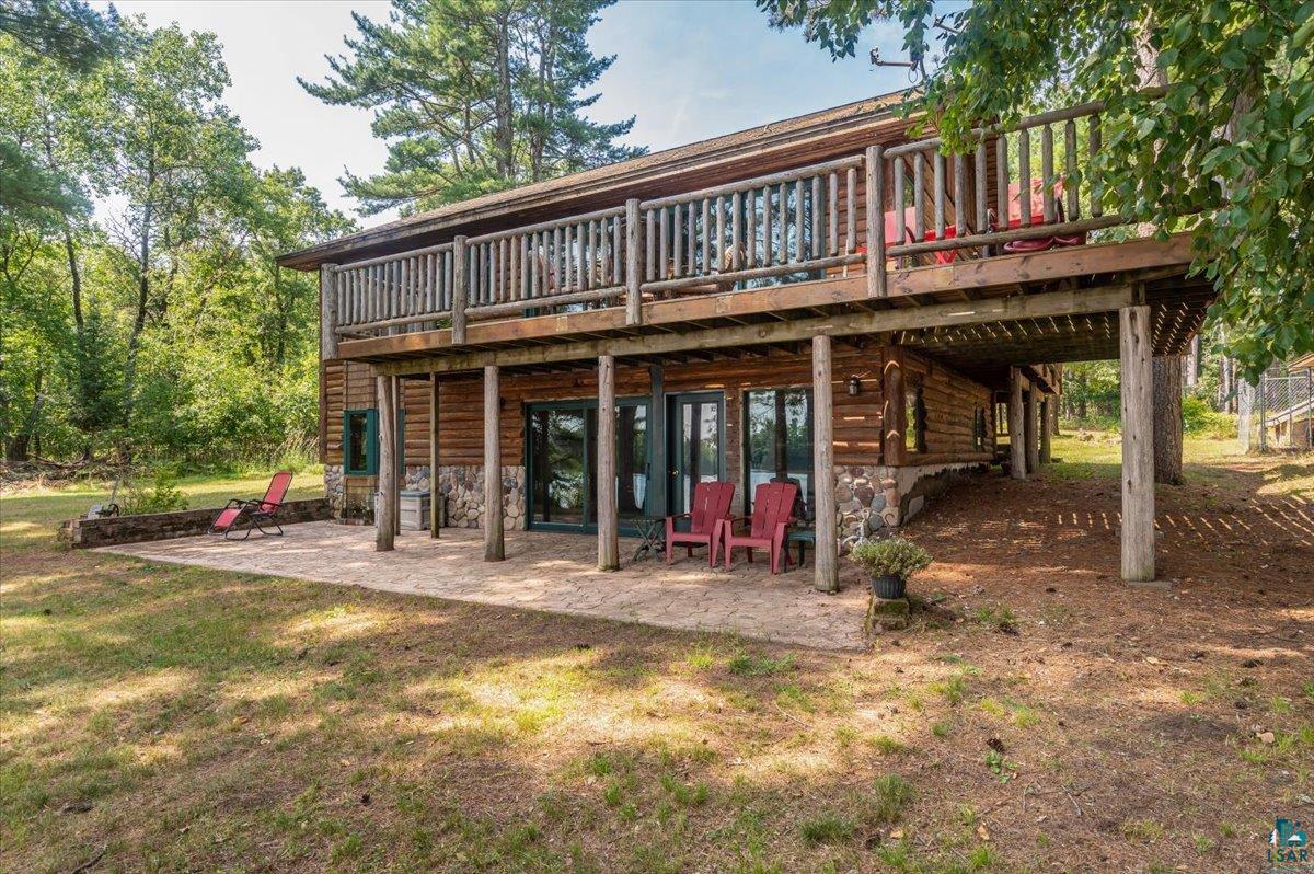 11758 South Long Lake Road Solon Springs, WI 54873 - Photo 34 of 38 Back of house featuring a deck, a yard, and a patio