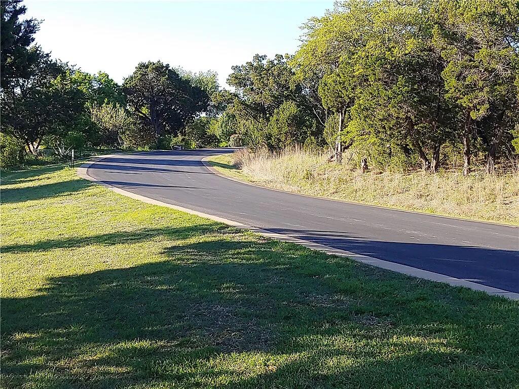 8102 Moon Rise Trail Jonestown, TX 78645 - Photo 29 of 33 a view of a yard with an outdoor space