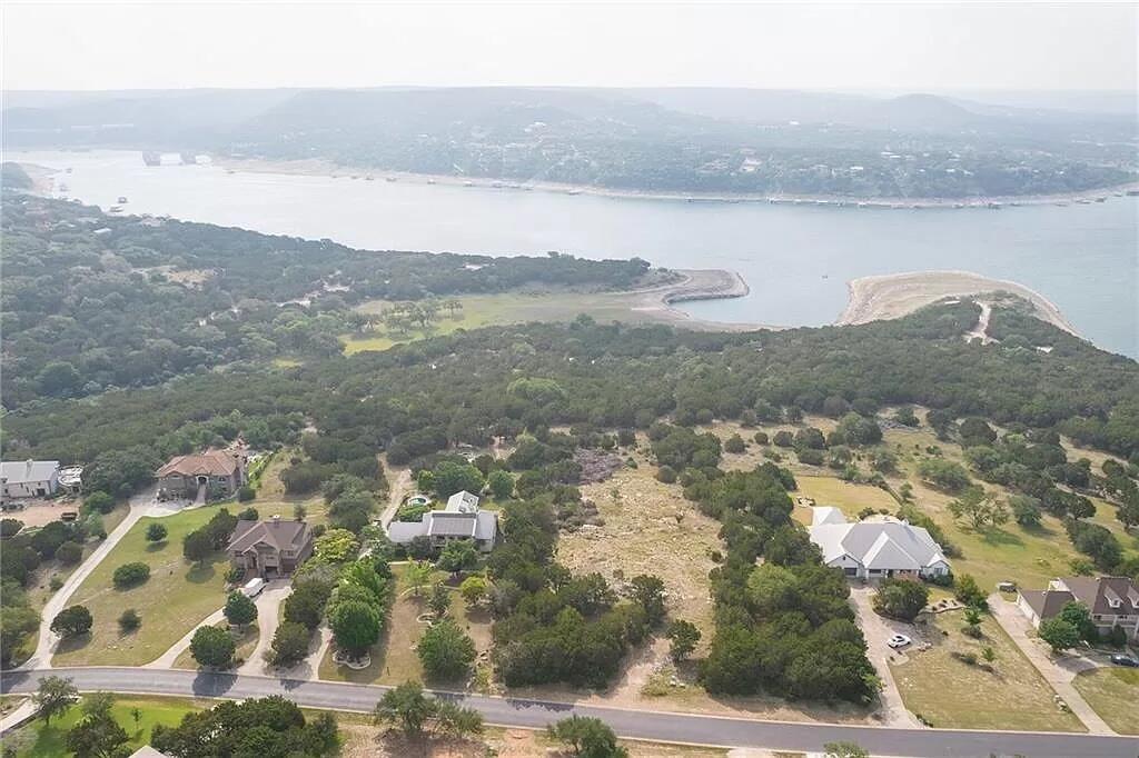 8102 Moon Rise Trail Jonestown, TX 78645 - Photo 30 of 33 a view of lake with mountain