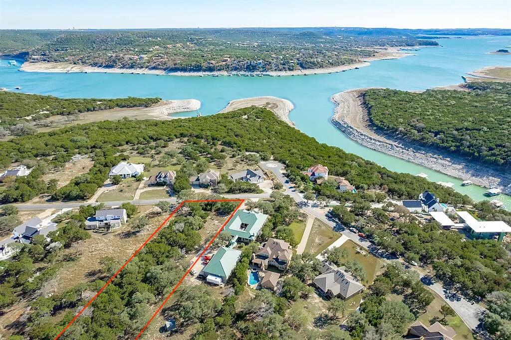 8102 Moon Rise Trail Jonestown, TX 78645 - Photo 7 of 33 an aerial view of ocean and residential houses with outdoor space