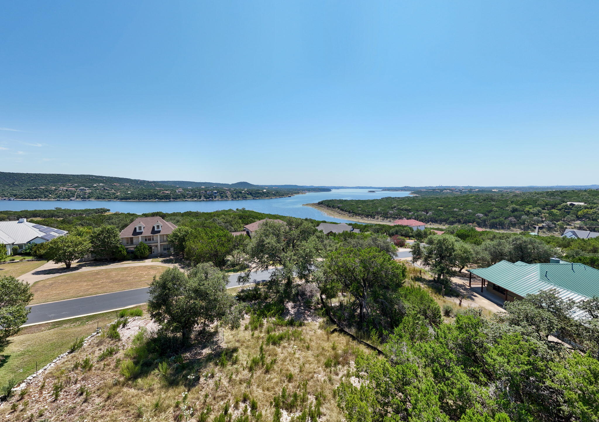 8102 Moon Rise Trail Jonestown, TX 78645 - Photo 9 of 33 an aerial view of a house with a yard