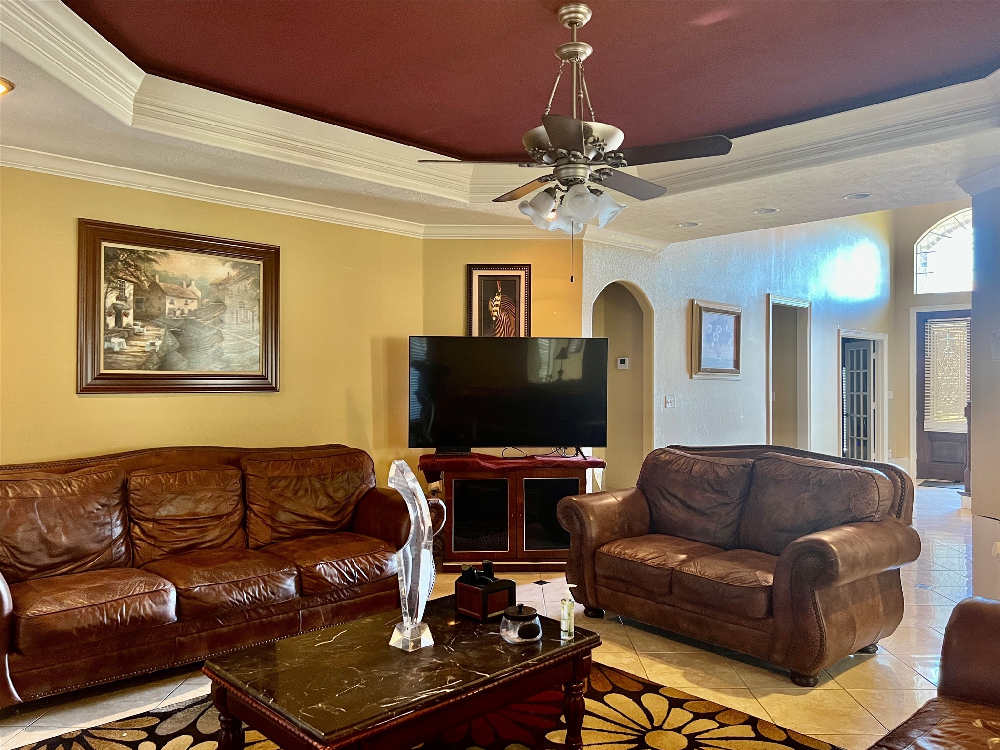 3301 Roya Court Port Arthur, TX 77642 - Photo 8 of 40 a living room with furniture a flat screen tv and a chandelier