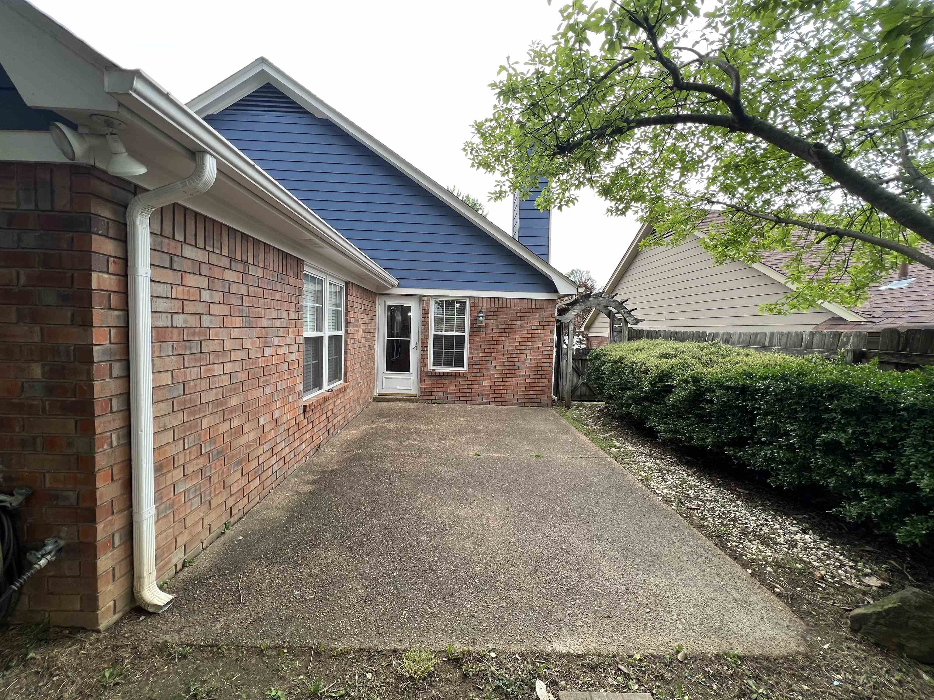 7429 Gingerhill Lane Bartlett, TN 38133 - Photo 12 of 20 a view of a house with a yard