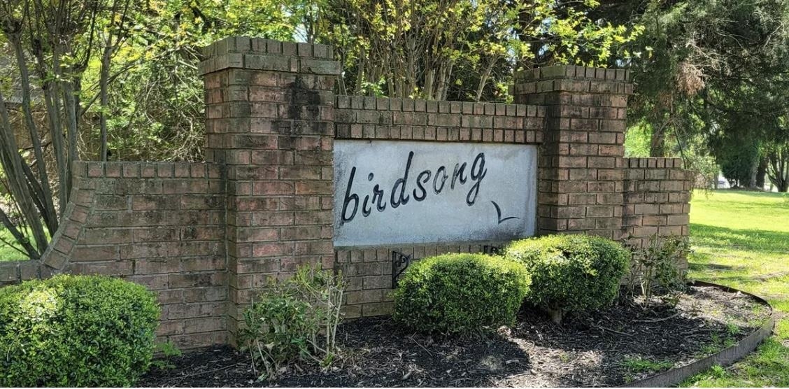 7429 Gingerhill Lane Bartlett, TN 38133 - Photo 17 of 20 a sign on the side of a building