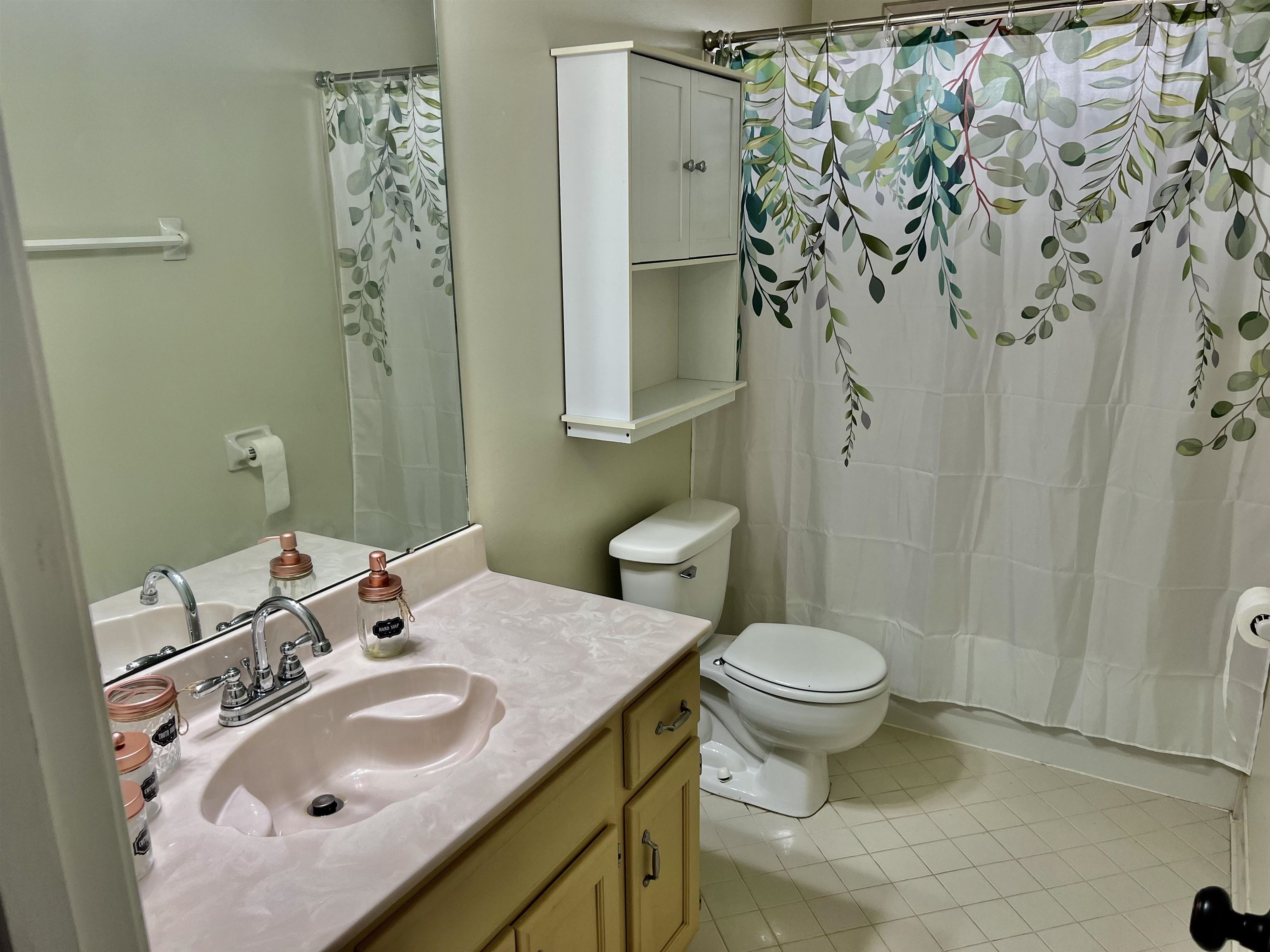 7429 Gingerhill Lane Bartlett, TN 38133 - Photo 6 of 20 a bathroom with a sink toilet and shower