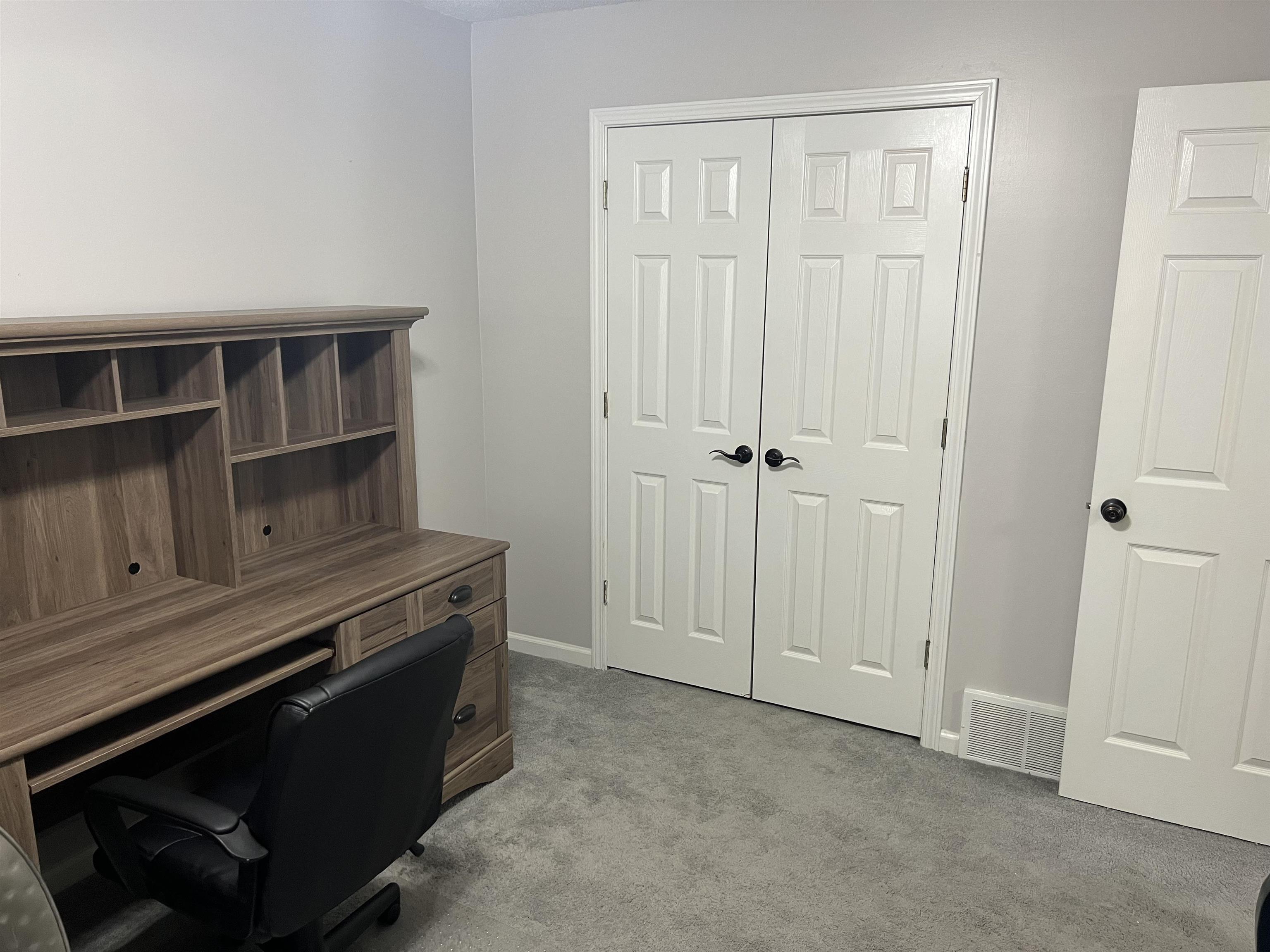 7429 Gingerhill Lane Bartlett, TN 38133 - Photo 7 of 20 an empty room with cabinet