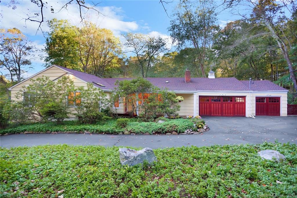 47 Buttery Road New Canaan, CT 06840 - Photo 1 of 1 a view of a house with a yard