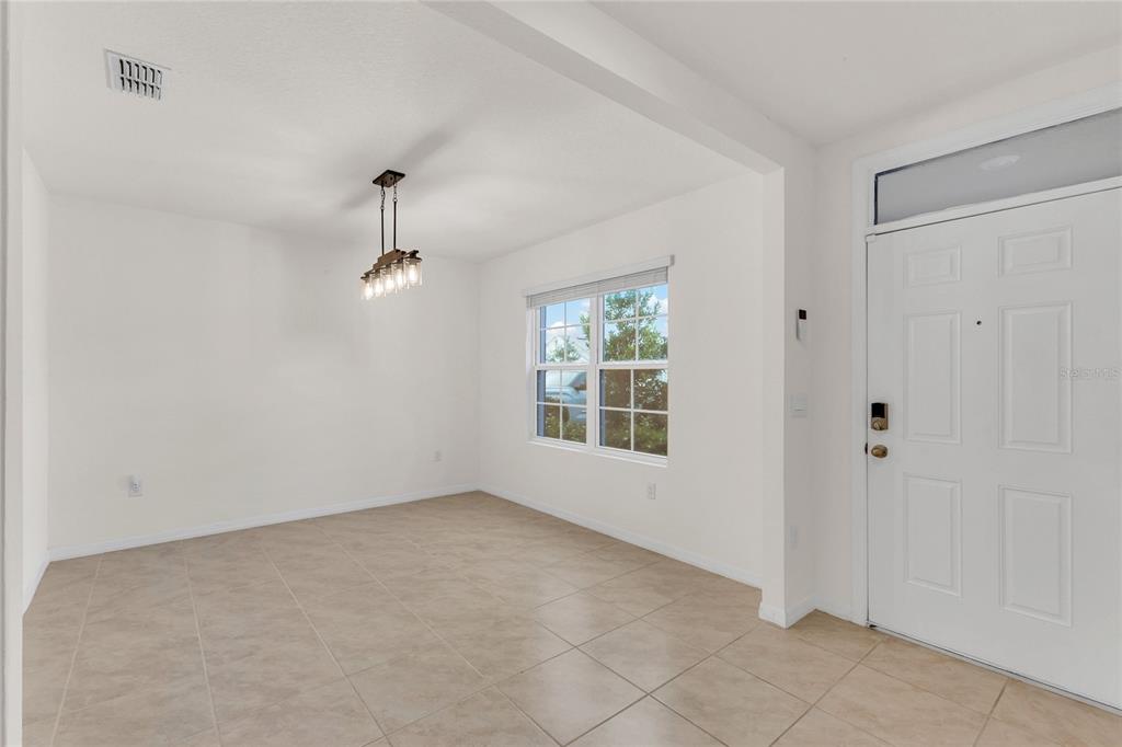 641 Talisi Loop St. Cloud, FL 34771 - Photo 11 of 40 an empty room with windows