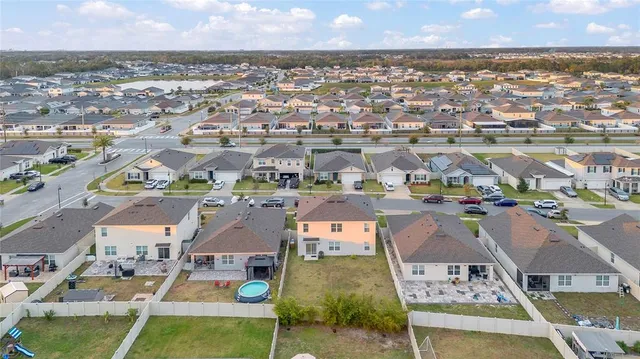 an aerial view of a city with lots of residential buildings