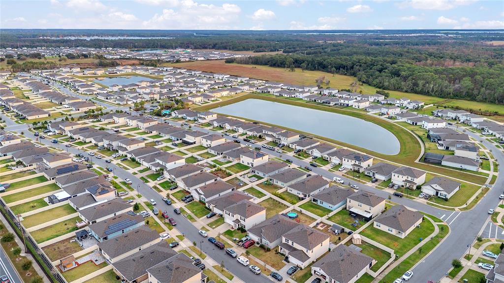 641 Talisi Loop St. Cloud, FL 34771 - Photo 34 of 40 a view of city and ocean