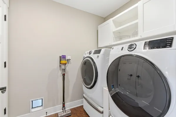 a white sink sitting next to a white cabinet