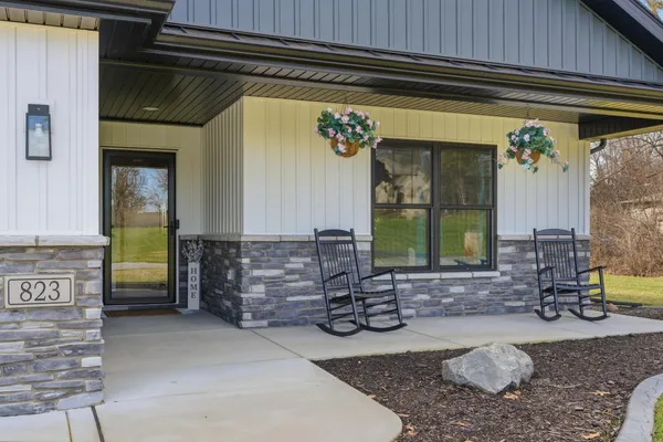 an aerial view of a house having yard