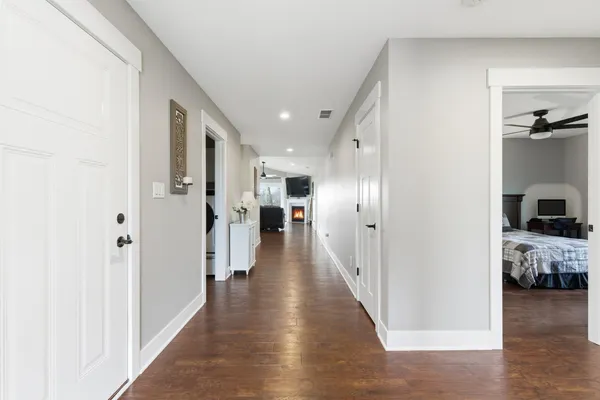 a kitchen with stove a sink and refrigerator