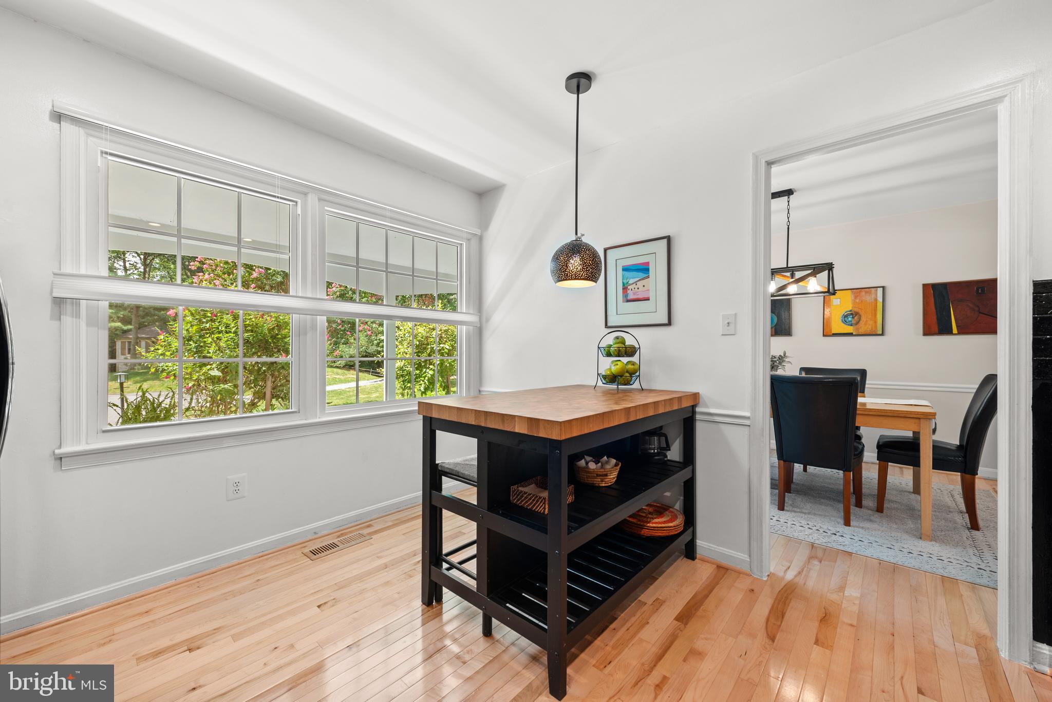 11612 Clipstone Lane Reston, VA 20191 - Photo 12 of 51 a room with furniture and a wooden floor