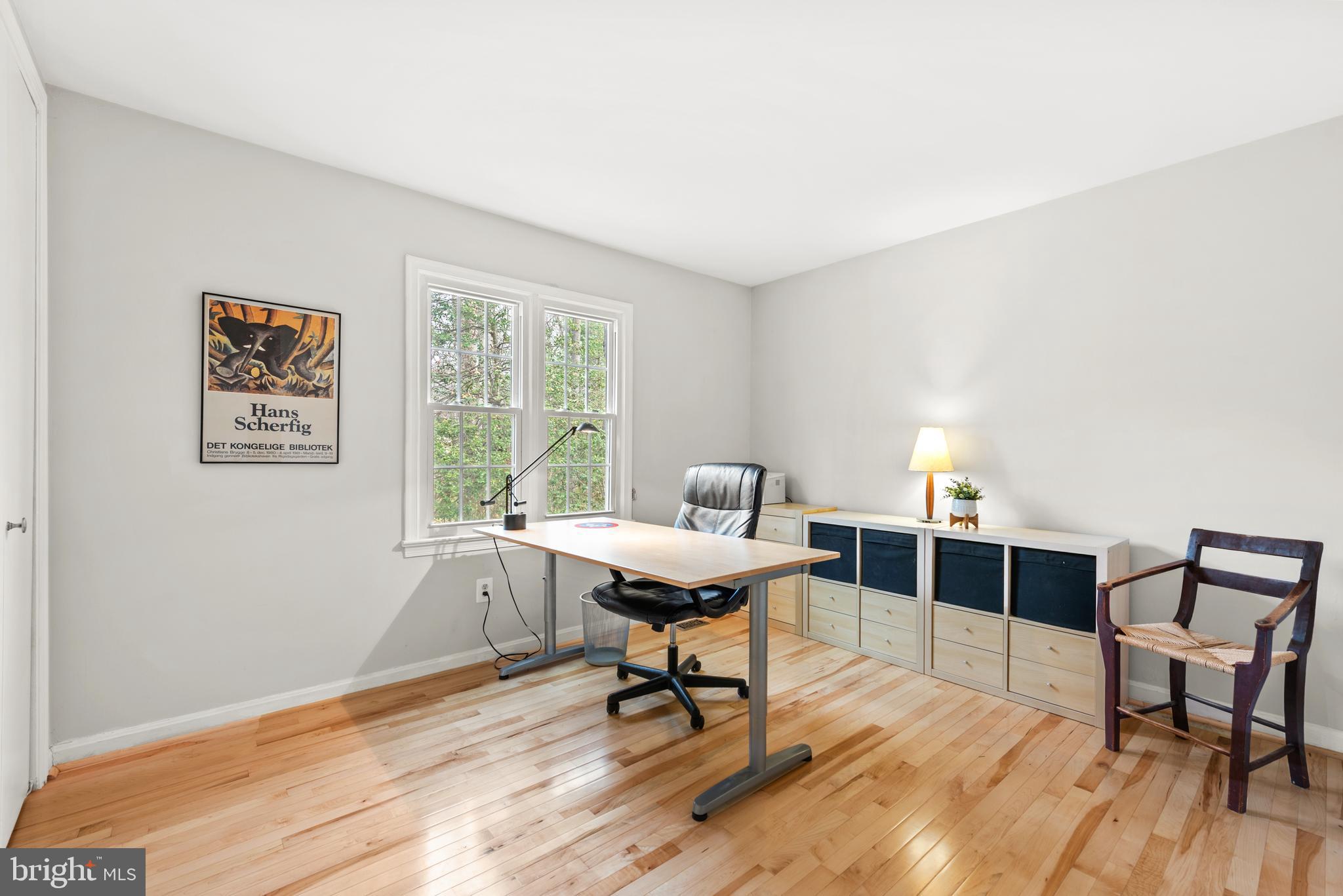 11612 Clipstone Lane Reston, VA 20191 - Photo 18 of 51 a workspace with furniture window and wooden floor