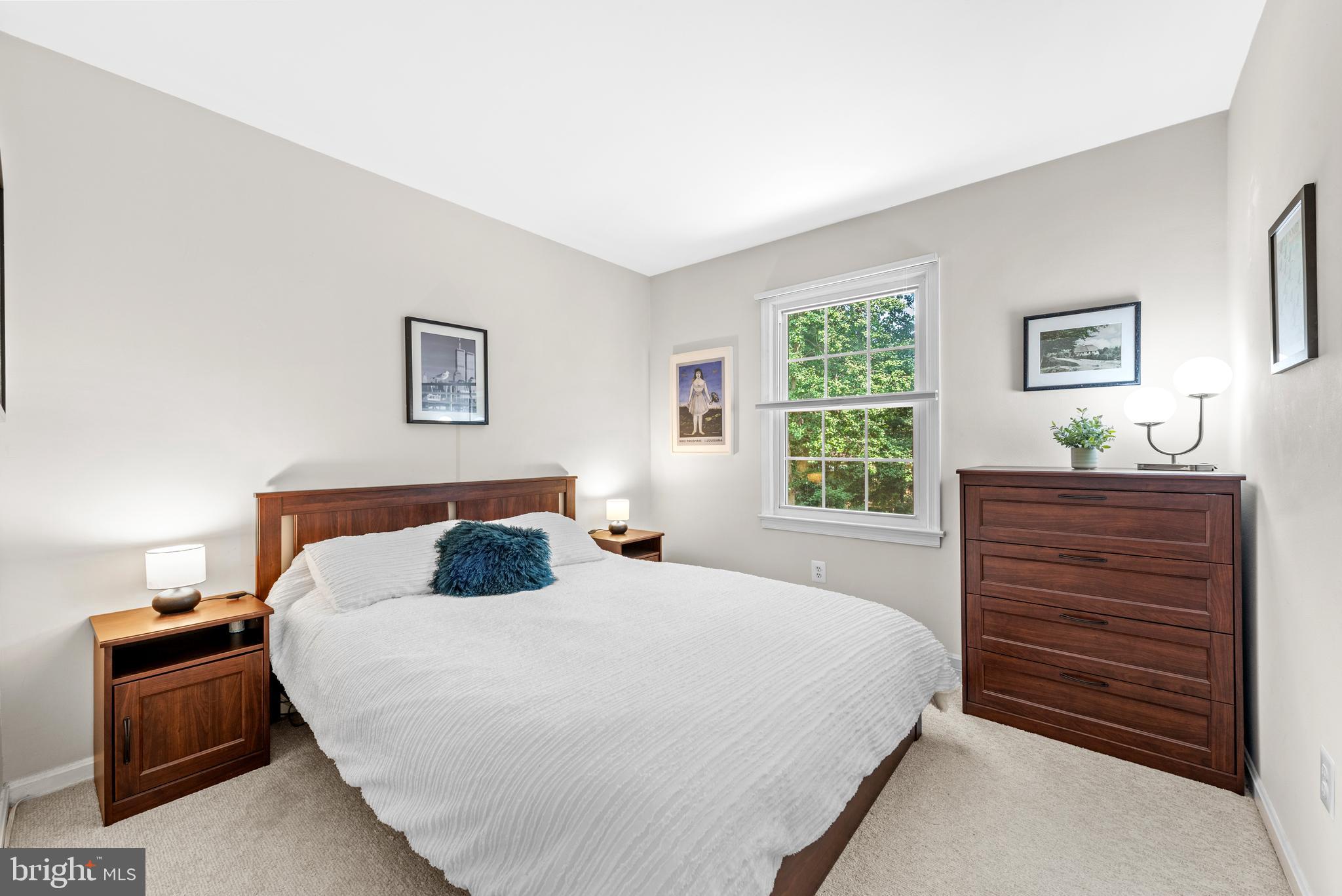 11612 Clipstone Lane Reston, VA 20191 - Photo 19 of 51 a bedroom with a bed and a window