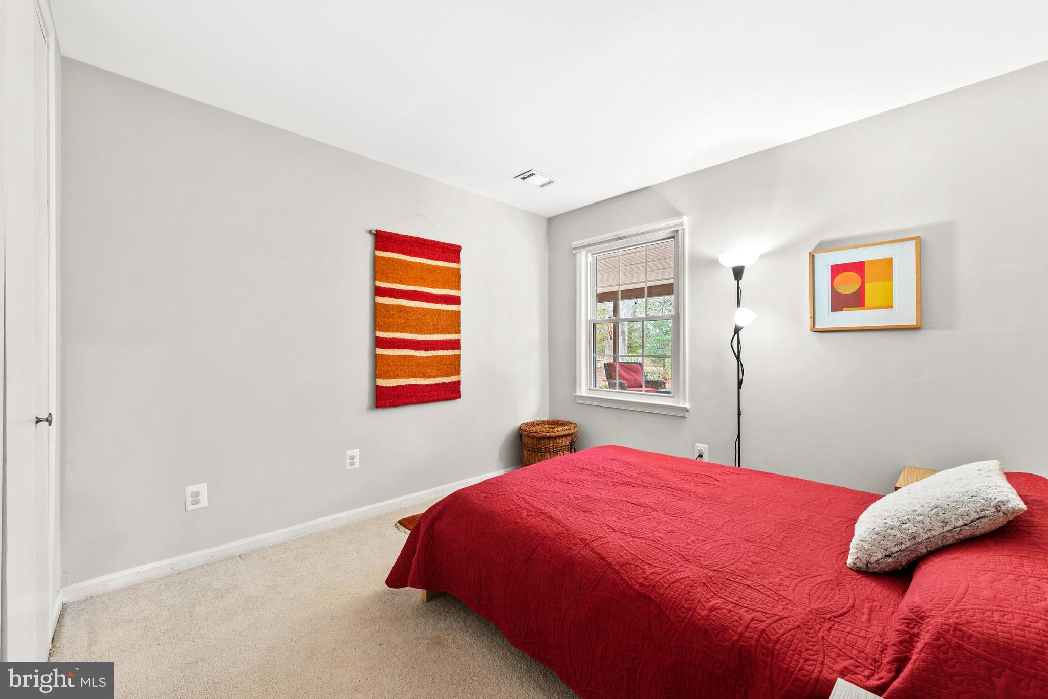 11612 Clipstone Lane Reston, VA 20191 - Photo 27 of 51 a bedroom with a bed and window