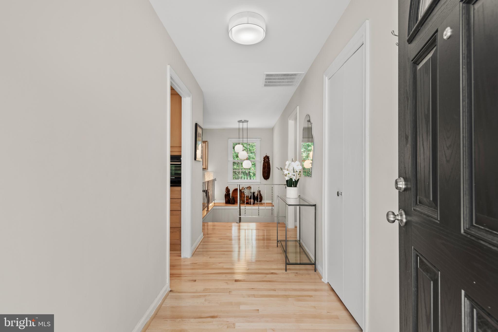 11612 Clipstone Lane Reston, VA 20191 - Photo 3 of 51 Enter to gleaming maple hardwood floors