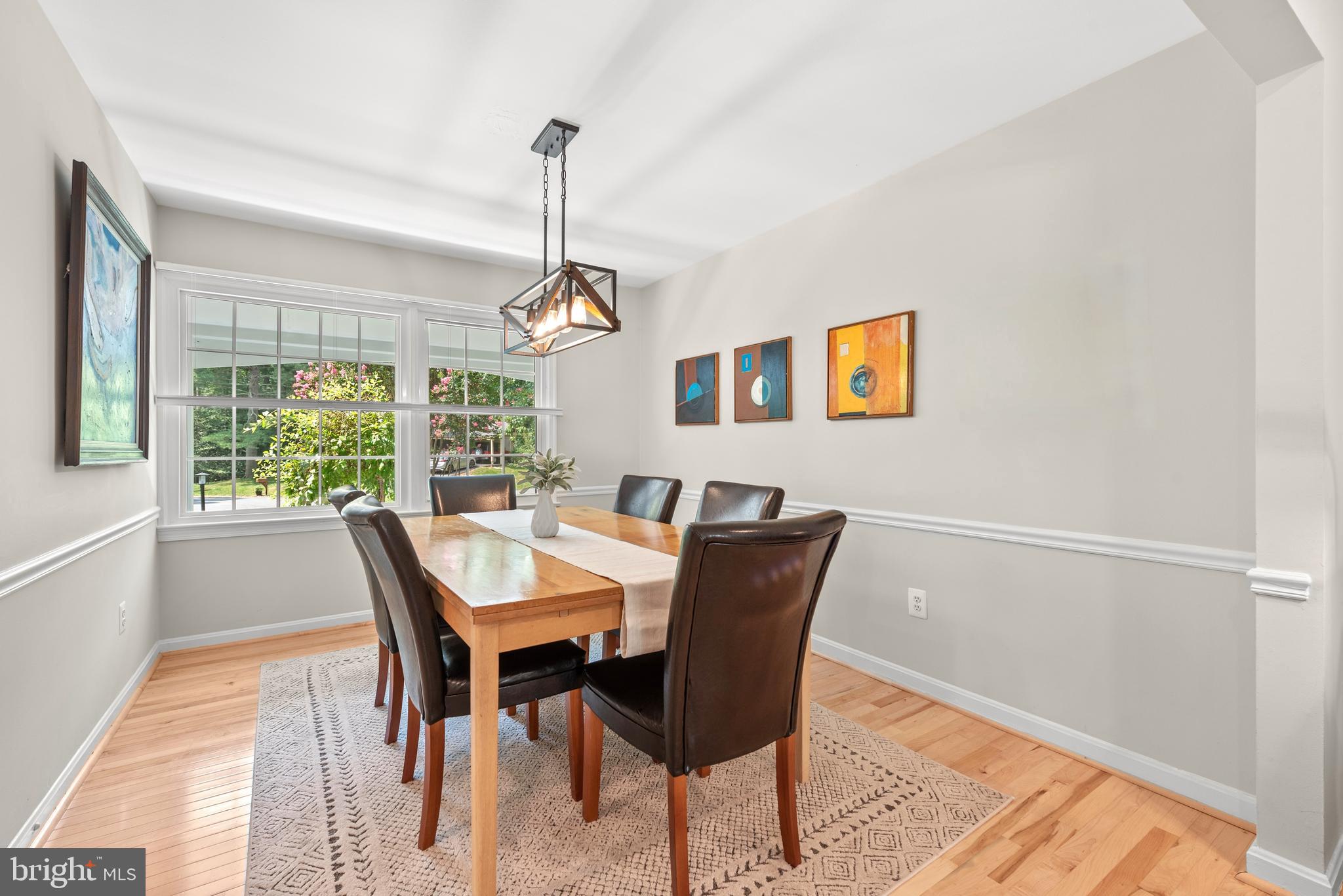 11612 Clipstone Lane Reston, VA 20191 - Photo 9 of 51 a view of a dining room with furniture window and wooden floor