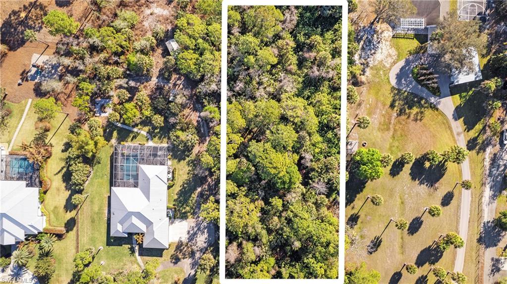 Aerial view of property and surrounding area featuring property parcel outlined