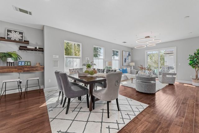 a kitchen with cabinets and stainless steel appliances