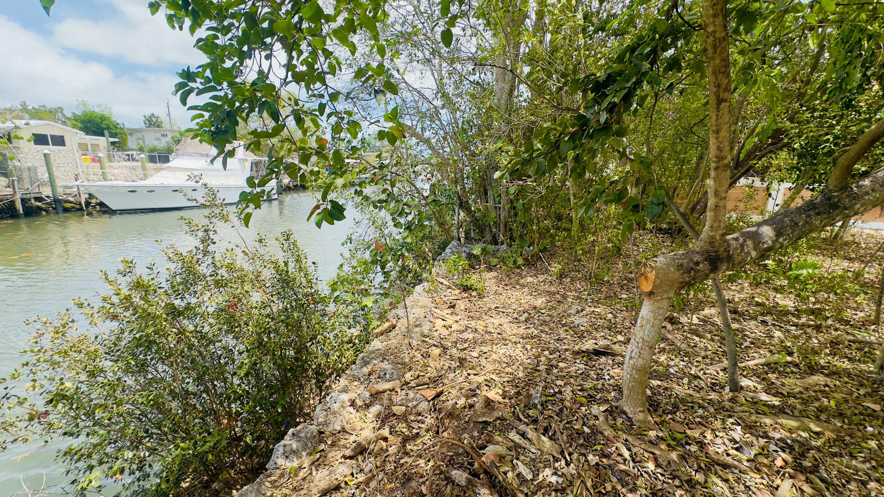 8 South Exuma Road Key Largo, FL 33037 - Photo 11 of 18 a view of a lake with houses