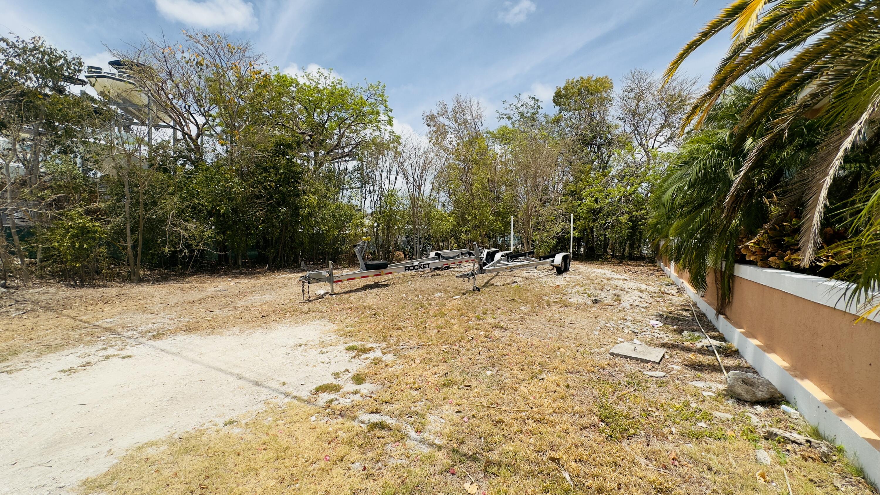 8 South Exuma Road Key Largo, FL 33037 - Photo 2 of 18 a view of swimming pool with a yard