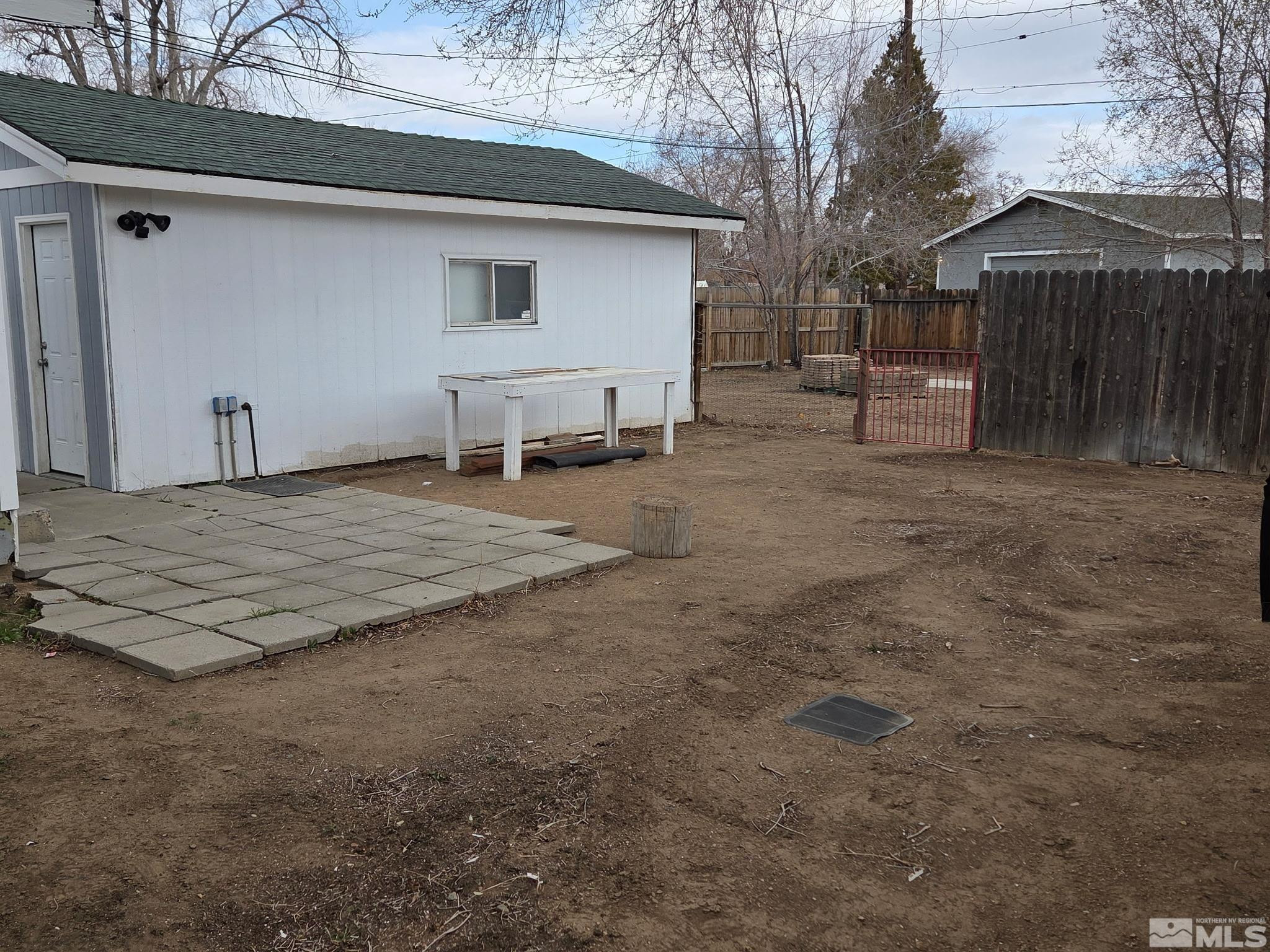 1810 Montello Street Reno, NV 89512 - Photo 18 of 22 a view of a house with a snow in the yard