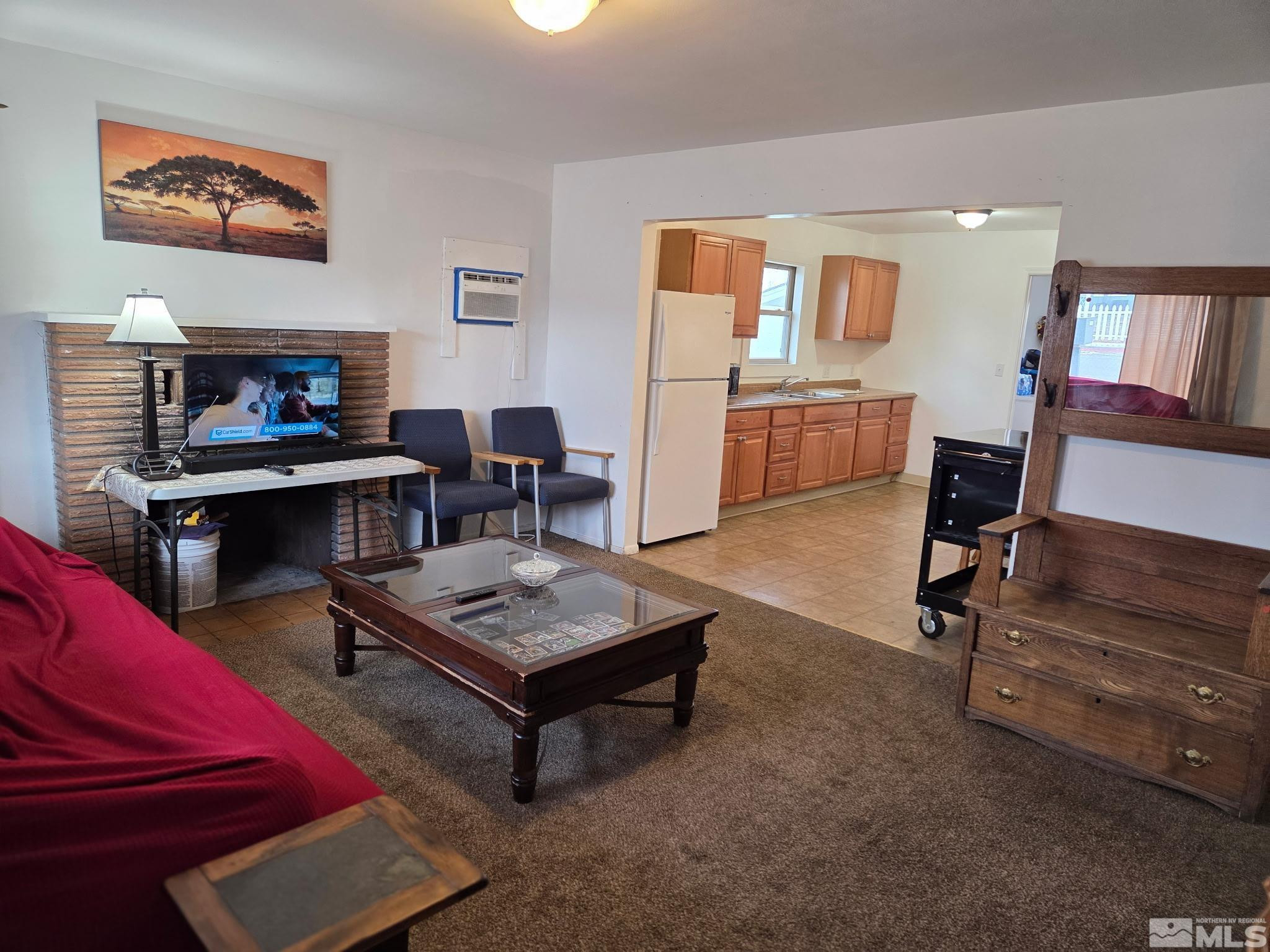 1810 Montello Street Reno, NV 89512 - Photo 2 of 22 a living room with furniture and a wooden floor