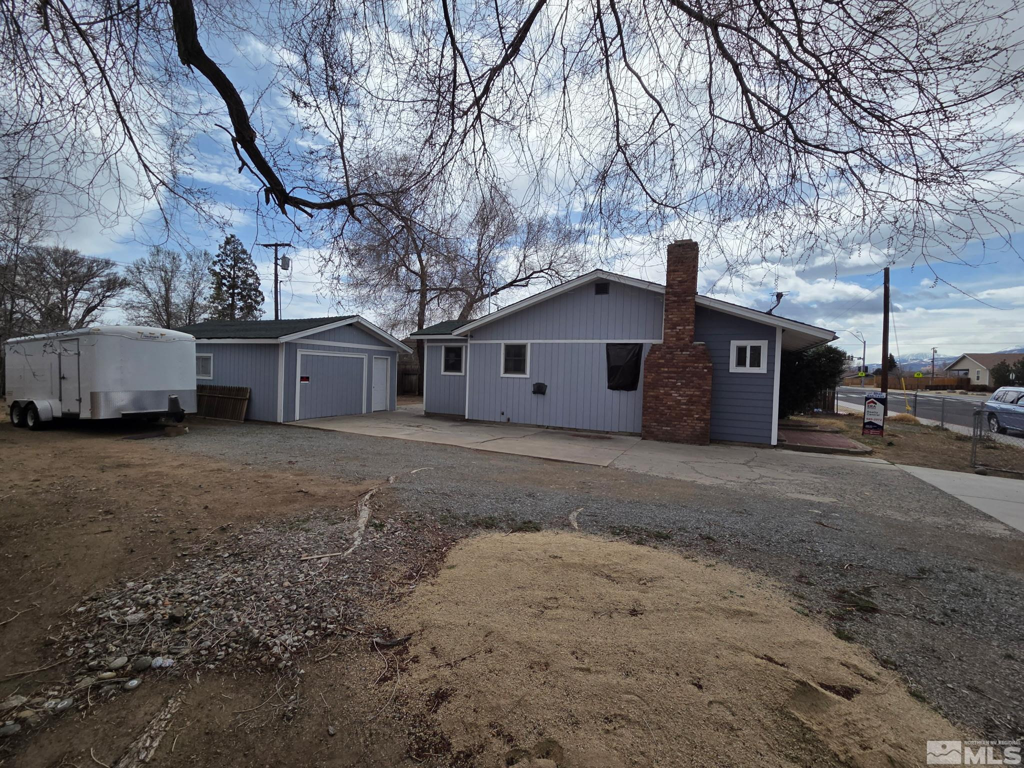 1810 Montello Street Reno, NV 89512 - Photo 21 of 22 a view of a house with a truck parked in front of house