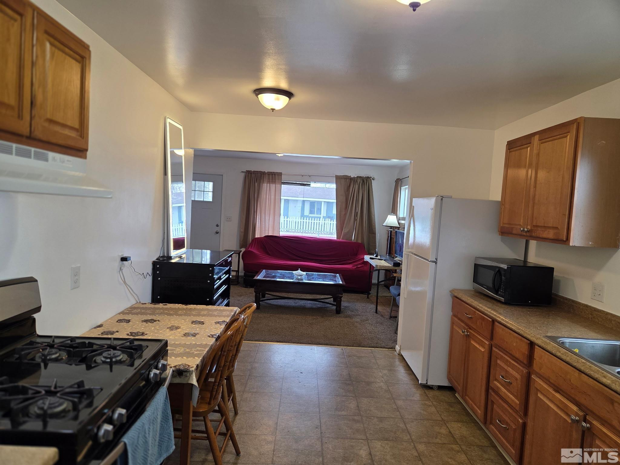 1810 Montello Street Reno, NV 89512 - Photo 5 of 22 a bedroom with a bed and furniture