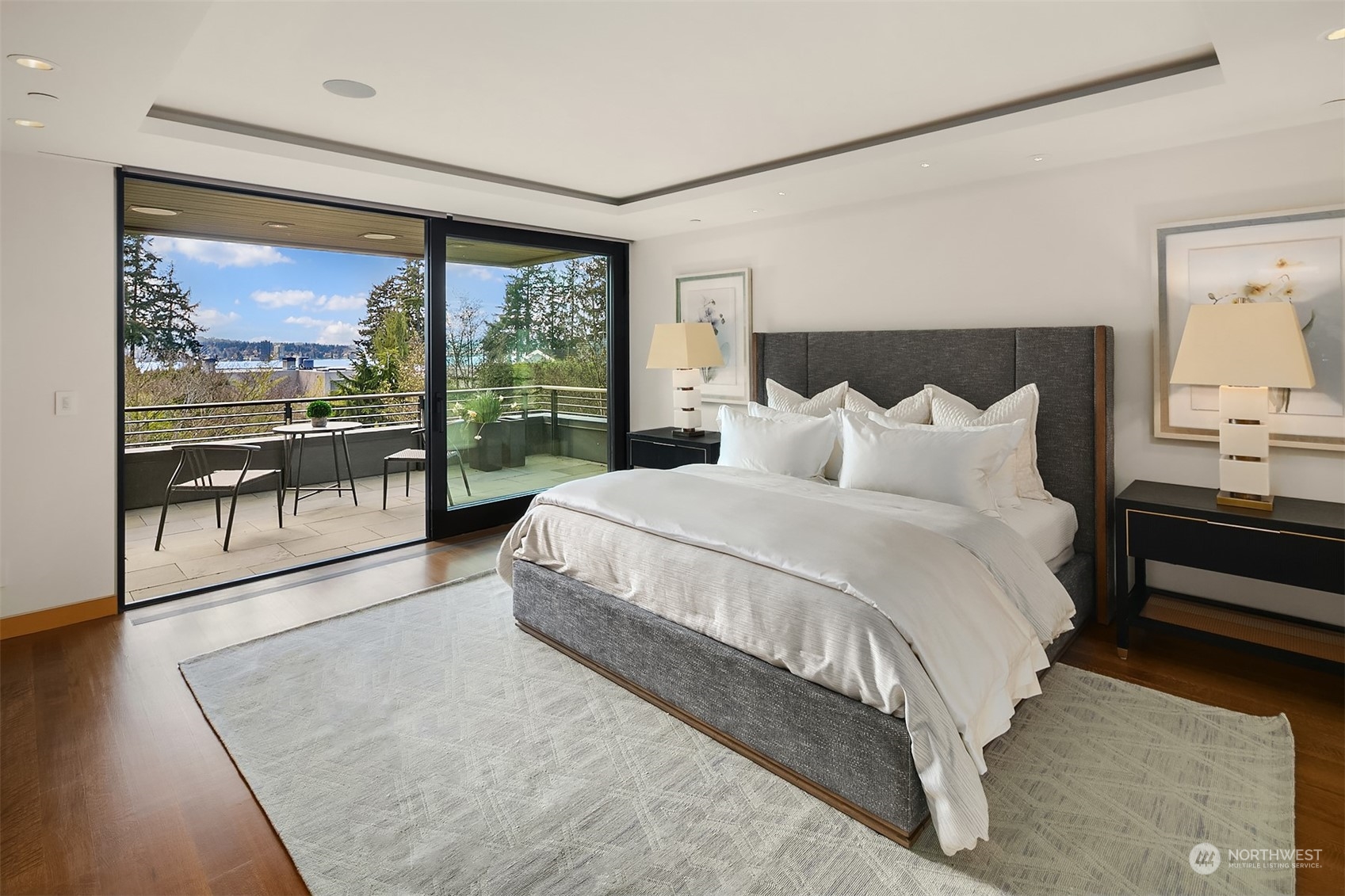 1829 Evergreen Point Road Medina, WA 98039 - Photo 18 of 39 a bedroom with a bed and a large window