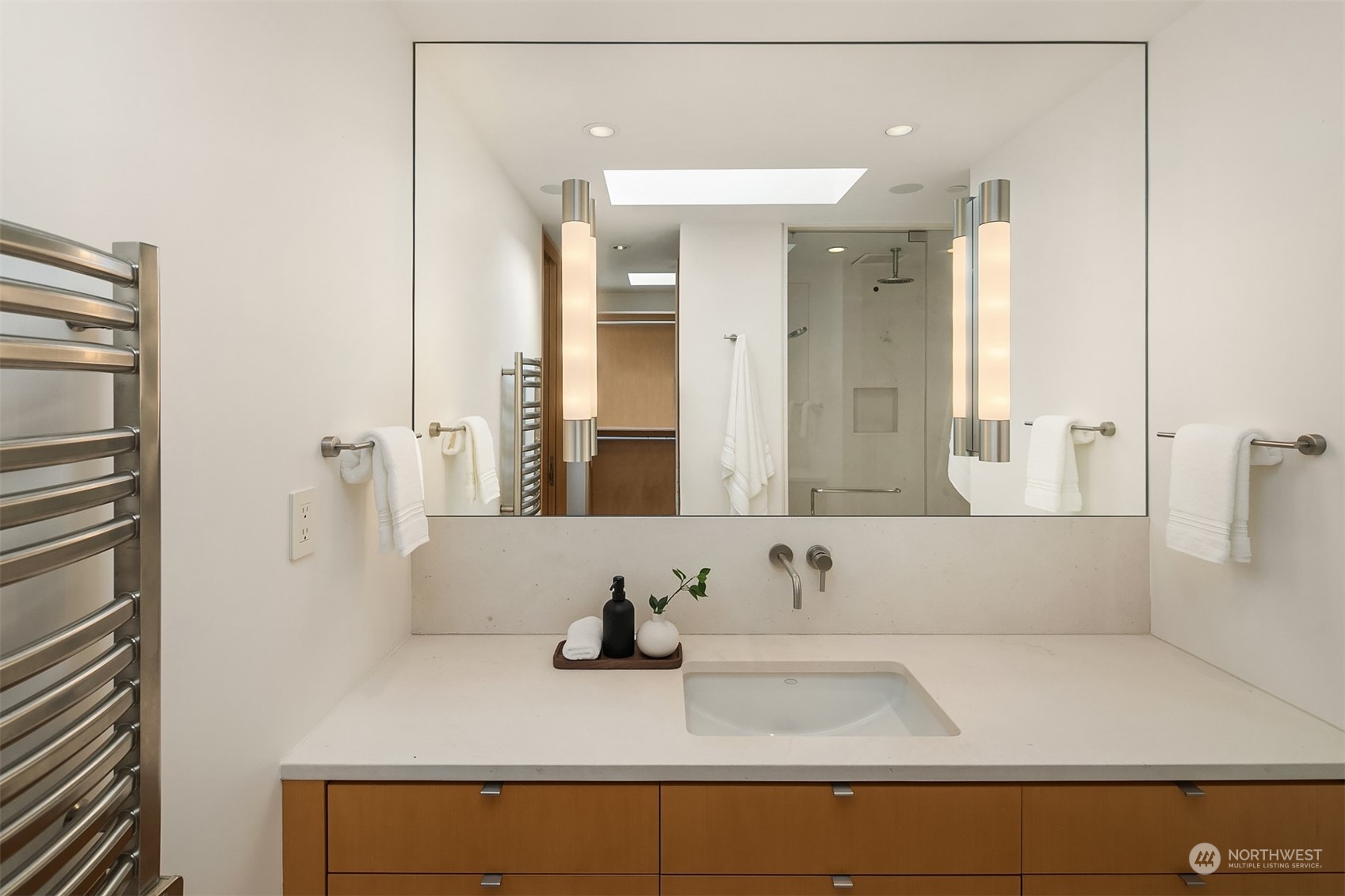 1829 Evergreen Point Road Medina, WA 98039 - Photo 24 of 39 a bathroom with a sink and a mirror