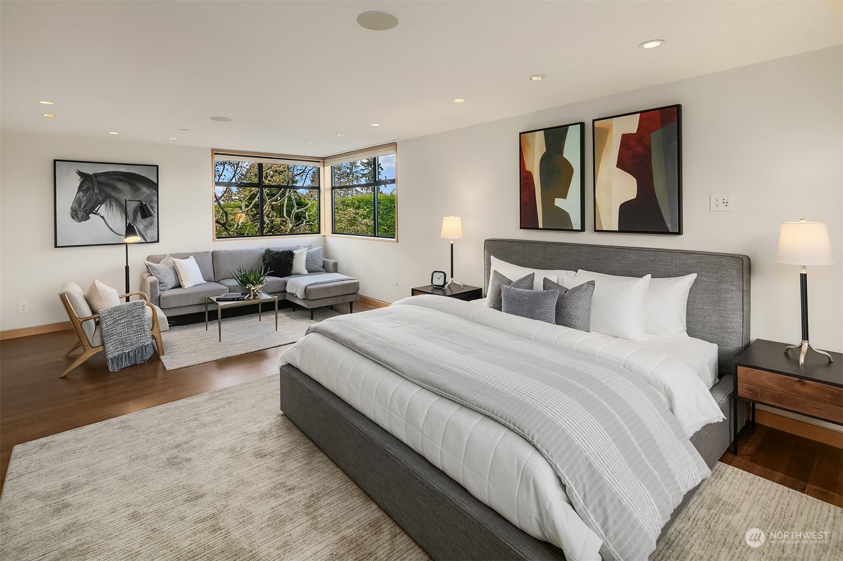1829 Evergreen Point Road Medina, WA 98039 - Photo 25 of 39 a spacious bedroom with a large bed and a couch