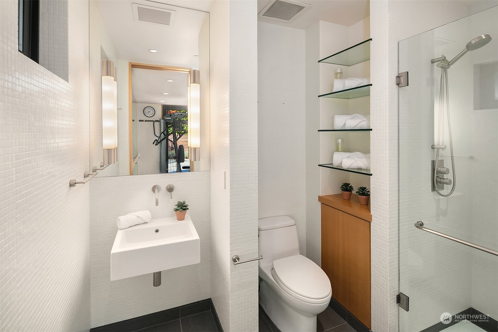 1829 Evergreen Point Road Medina, WA 98039 - Photo 30 of 39 a bathroom with a sink toilet and shower