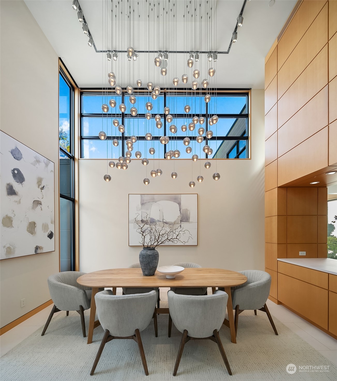1829 Evergreen Point Road Medina, WA 98039 - Photo 3 of 39 a view of a dining room with furniture and window