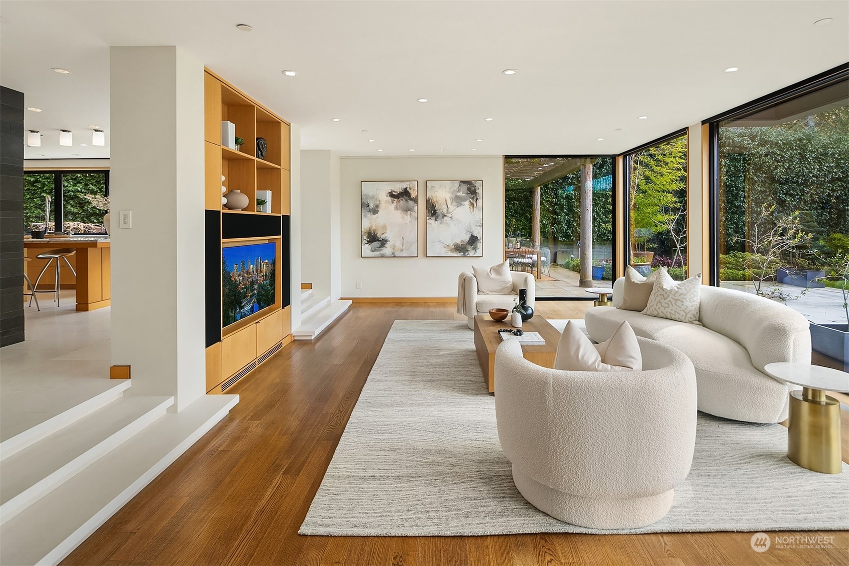 1829 Evergreen Point Road Medina, WA 98039 - Photo 6 of 39 a living room with fireplace furniture and a flat screen tv