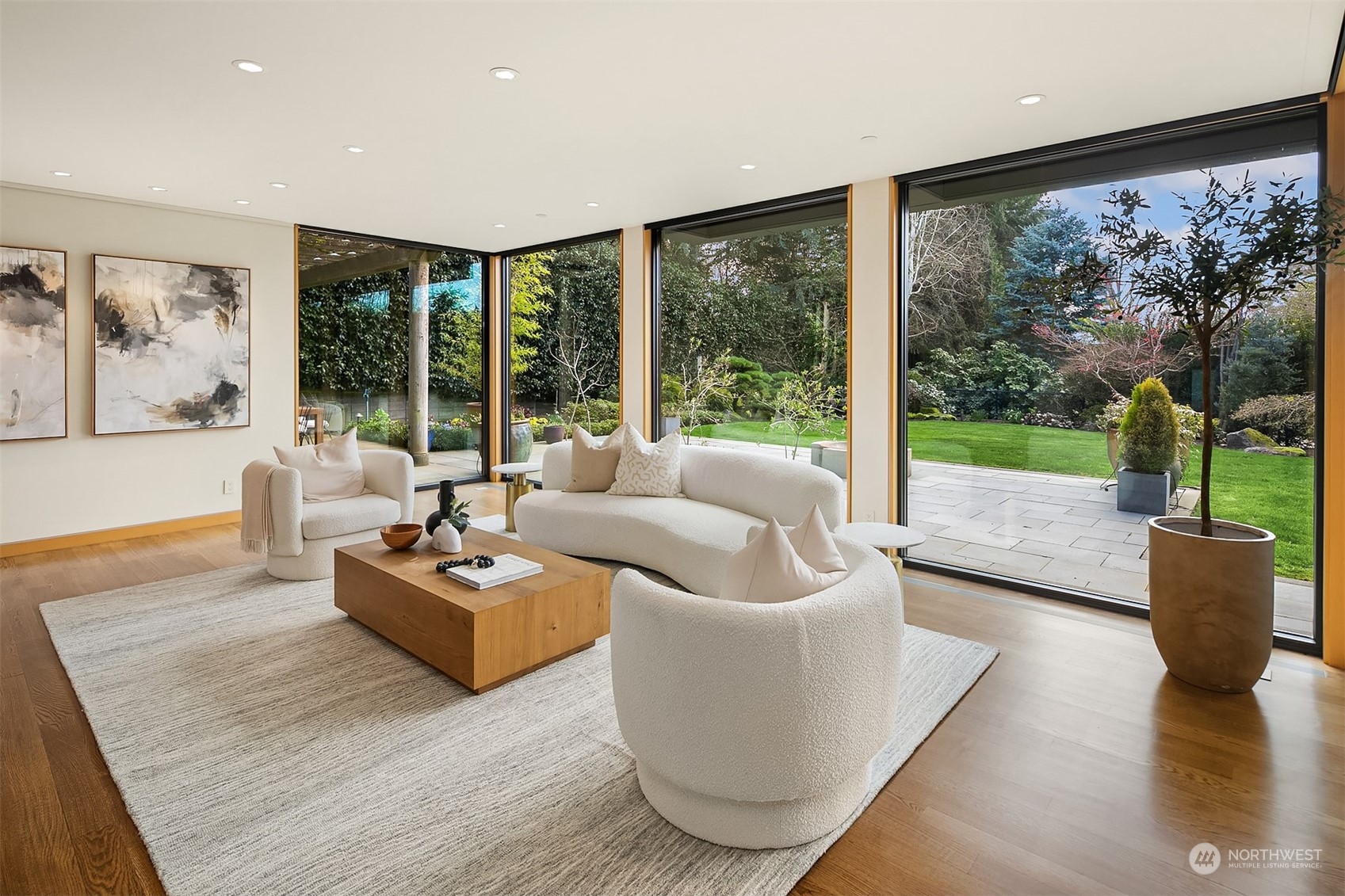 1829 Evergreen Point Road Medina, WA 98039 - Photo 7 of 39 a living room with furniture and a large window